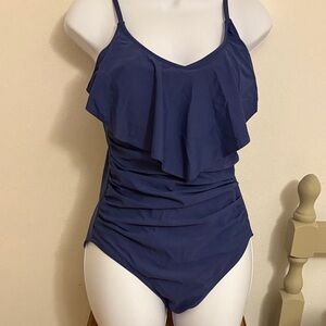 Navy Blue Ruffled One Piece Swimsuit. So unique and pretty.